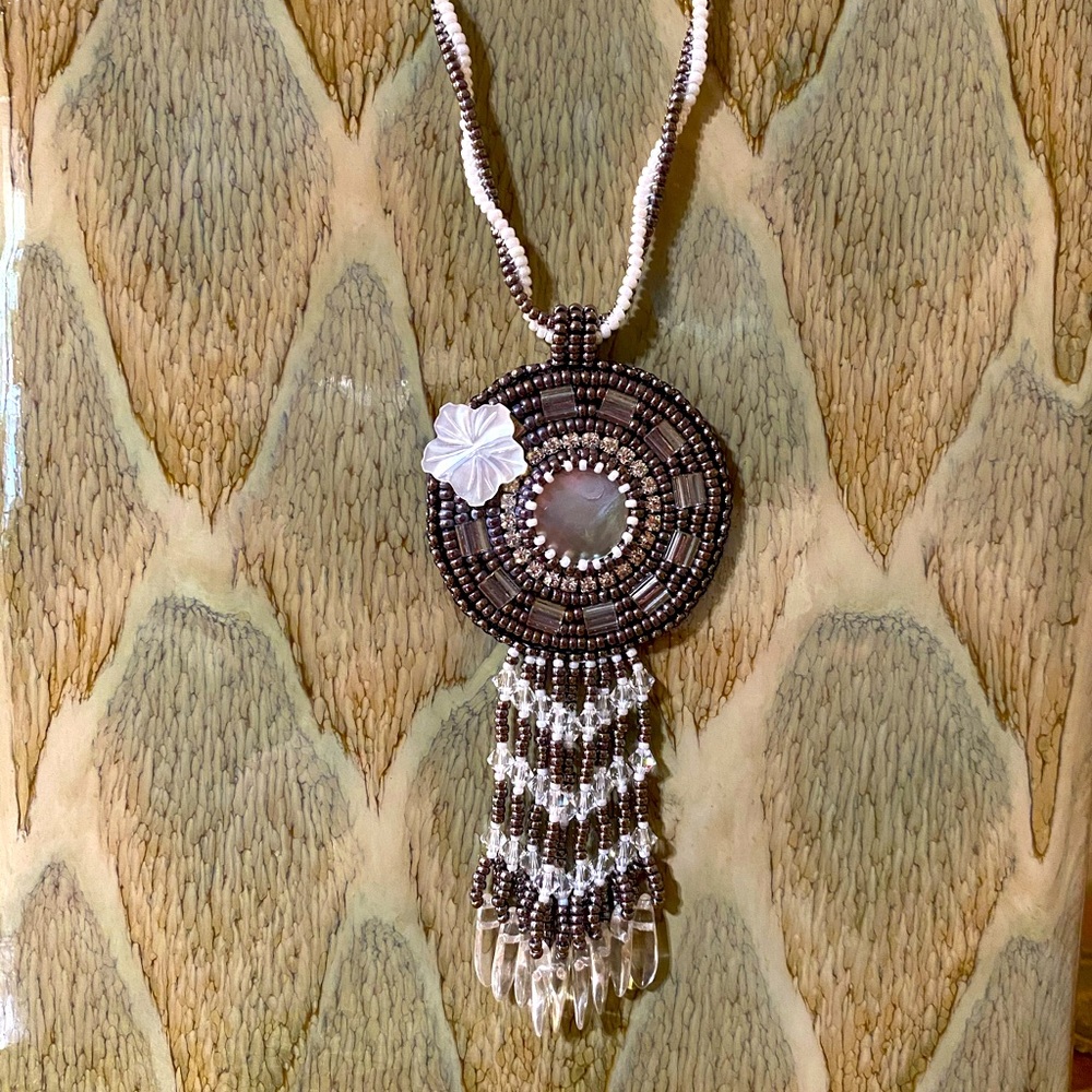 Hand beaded pendant with fringe